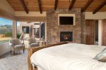There is a gas fireplace for extra warmth in the cooler months and a flat screen TV for entertainment